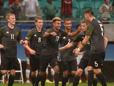 Jerman dan Meksiko bermain imbang 2-2 pada laga perdana Grup C Olimpiade Rio 2016 di Arena Fonte Nova, Jumat (5/8/2016) dini hari WIB. (AFP/Nelson Almeida)