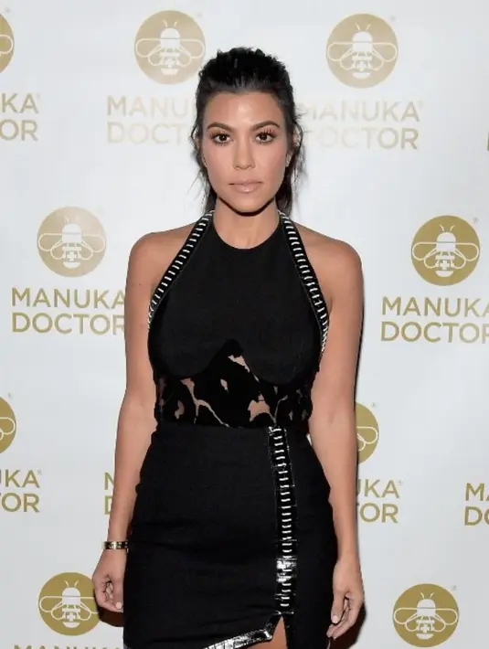 "Meski Kourtney senang karena Scott sudah berubah, namun ia masih sebal karena Scott tak melakukan itu untuknya," ujar seorang sumber seperti yang dilansir dari HollywoodLife. (CHARLEY GALLAY / GETTY IMAGES NORTH AMERICA / AFP)