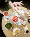 The St. Regis Jakarta berkolaborasi dengan seniman ternama Indonesia, Eddy Susanto, hadirkan " Kanvas Rasa: Indonesia in Ink & Sugar ", sebuah pengalaman afternoon tea edisi terbatas. / Foto dok: The St. Regis Jakarta.