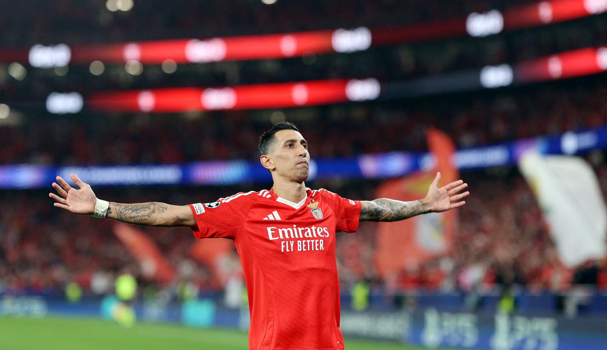 Pemain Benfica, Angel Di Maria, melakukan selebrasi setelah mencetak gol ke gawang Atletico Madrid pada matchday kedua Liga Champions di Estadio do Benfica, Kamis (3/10/2024). (AFP/Filipe Amorim)