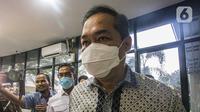 Mantan Menteri Perdagangan (Mendag) Muhammad Lutfi tiba memenuhi panggilan pemeriksaan di Gedung Bundar Kejaksaan Agung (Kejagung), Jakarta Selatan, Rabu (22/6/2022). Muhammad Lutfi diperiksa terkait kasus mafia minyak goreng, dalam hal ini perkara dugaan tindak pidana korupsi pemberian fasilitas ekspor Crude Palm Oil (CPO) dan turunannya pada Januari 2021 sampai dengan Maret 2022. (Liputan6.com/Faizal Fanani)