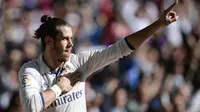 Gelandang Real Madrid, Gareth Bale, merayakan gol yang dicetaknya ke gawang Leganes pada laga La Liga di Stadion Santiago Bernabeu, Madrid, Minggu (6/11/2016). (AFP/Javier Soriano)