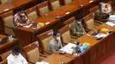 Menteri Pendidikan Nadiem Makarim saat rapat dengan Komisi X DPR, di Senayan, Jakarta, Kamis (18/3/2021). Dalam rapat teresebut membahas persiapan pembelajaran tatap muka kembali dan penerimaan mahasiswa baru 2021. (Liputan6.com/Angga Yuniar)
