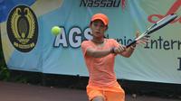 Petenis Indonesia, Priska Madelyn Nugroho memboyong gelar juara tunggal putri turnamen pekan pertama Divisi 1 ITF Asia 14 & Under Development Championship 2017. (Pelti)