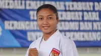 Karateka Bali, Cok Istri Agung Sanistyarani, saat berlatih di GOR Praja Raksaka, Denpasar. Coki berambisi mempertahankan emas di PON 2020 Papua dan menembus Olimpiade Paris 2024. (Bola.com/Maheswara Putra)