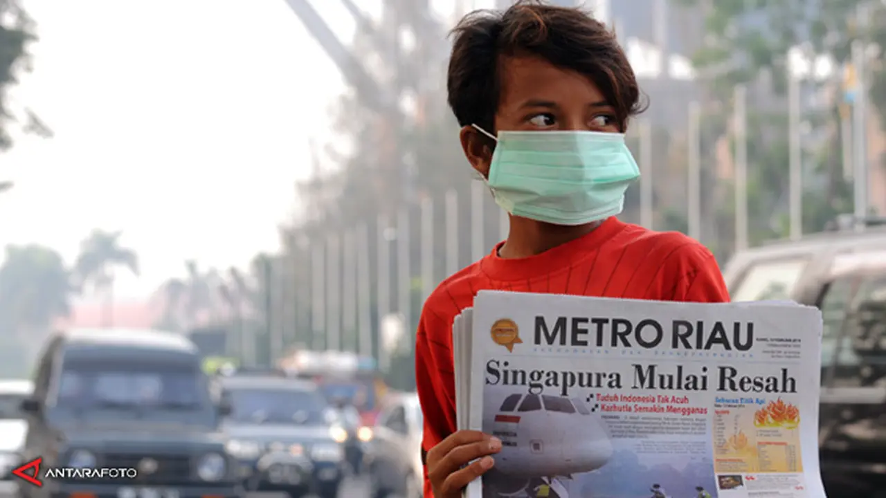 kabut-asap-riau-140213c.jpg