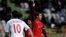 Ekspresi Cristiano Ronaldo saat memprotes wasit saat pertandingan persahabatan antara Portugal melawan Bulgaria di Stadion Magalhaes Pessoa, Leiria, Portugal, (25/3/2016). (AFP/Francisco Leong)