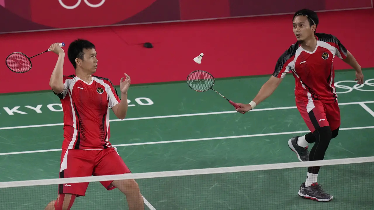 Foto: Hendra Setiawan/Mohammad Ahsan Menutup Hegemoni Tim Bulu Tangkis Indonesia di Hari Pertama Olimpiade Tokyo 2020