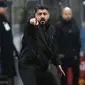 Ekspresi pelatih AC Milan, Gennaro Gattuso pada laga perempat final Coppa Italia yang berlangsung di stadion San Siro, Milan, Rabu (30/1). AC Milan menang 2-0 atas Napoli (AP Photo/Antonio Calanni)