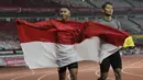 Pelari Indonesia, Abdul Halim Dalimunthe, melakukan selebrasi usai finis di posisi dua nomor 100M T11 pria pada Asian Para Games di SUGBK, Jakarta, Rabu (10/10/2018). Abdul Halim meraih medali perak. (Bola.com/M Iqbal Ichsan)