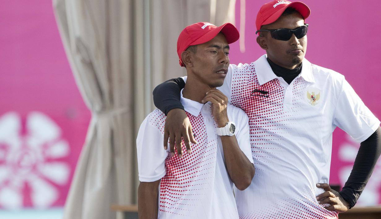 Kacung atlet Lawnball Indonesia bertanding di nomor B2 Open Single's pada Asian Para Games 2018 di Stadion Hockey, Gelora Bung Karno Jakarta, Senin (8/10/2018).  (Bola.com/Peksi Cahyo)