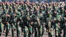 Atraksi bela diri prajurit TNI pada perayaan HUT ke-74 TNI di Taxy Way Echo Lanud Halim Perdanakusuma, Jakarta Timur, Sabtu (5/10/2019). HUT ke-74 TNI dihadiri oleh Presiden Joko Widodo atau Jokowi yang bertindak sebagai insprektur upacara. (Liputan6.com/JohanTallo)