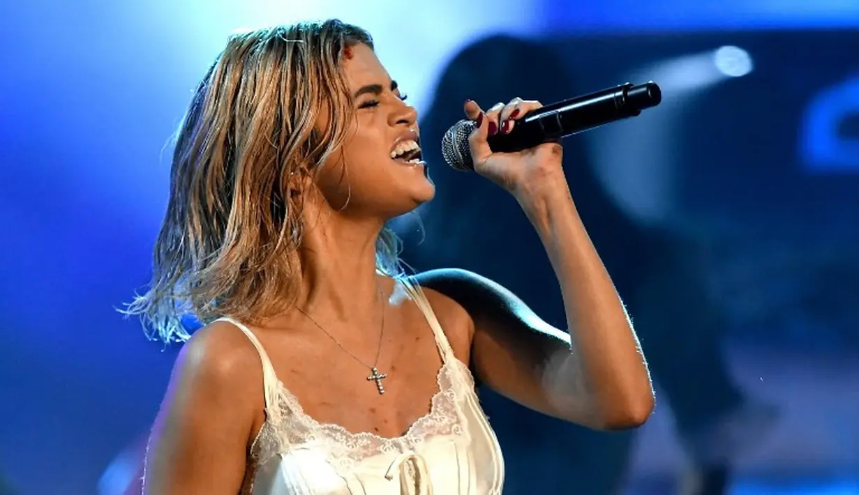 Dilansir dari HollywoodLife, Selena Gomez mencurahkan isi hatinya lewat album terbarunya tersebut. (KEVIN WINTER / GETTY IMAGES NORTH AMERICA / AFP)