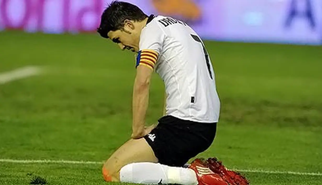 Reaksi kekecewaan striker Valencia, David Villa pada partai La Liga menghadapi Racing Santander di Estadio Mestalla, Valencia, 8 Maret 2010. AFP PHOTO/JOSE JORDAN