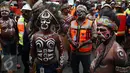 Ratusan karyawan PT Freeport Indonesia (FI) berunjuk rasa di depan Kementerian Energi dan Sumber Daya Mineral (ESDM) Jakarta, Selasa (7/3). Dalam aksinya, mereka menuntut pemerintah agar tidak memaksakan perubahan Kontrak Karya. (Liputan6.com/Johan Tallo)