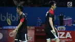 Pebulu tangkis putra campuran Indonesia, M Ahsan/Hendra Setiawan saat melawan Markus Ellis/Chris Langridge (Inggris) di Babak 32 besar Indonesia Open 2019 di Istora Senayan, Jakarta, Rabu (17/7/2019). M Ahsan/Hendra Setiawan unggul 28-26, 21-17. (Liputan6.com/Helmi Fitrhiansyah)