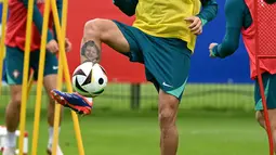 Portugal melaju ke babak perempat final Euro 2024, setelah susah payah menyingkirkan Slovenia lewat adu penalti. (PATRICIA DE MELO MOREIRA / AFP)