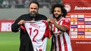 Marcelo Vieira punya klub baru. Setelah kontraknya habis di Real Madrid, bek asal Brasil memulai petualangan selanjutnya di klub Yunani, Olympiakos Piraeus. (AFP/Angelos Tzortzinis)
