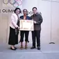 Lisa Rumbewas pingsan setelah menerima medali perunggu Olimpiade 2008 Beijing, Minggu (3/12/2017). (Liputan6.com/Risa Kosasih)