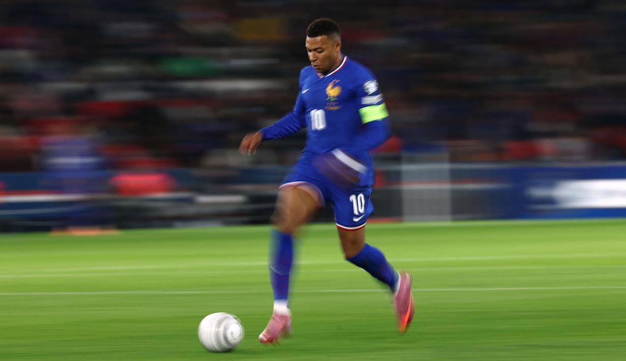 Pemain Real Madrid itu juga berperan melakukan assist dalam gol kedua Prancis yang dicetak oleh Adrien Rabiot. (AFP/Franck Fife)