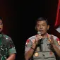 Kapolri Jenderal Pol Idham Aziz (kanan) memberikan paparan dalam diskusi panel VIII Rakornas Indonesia Maju antara Pemerintah Pusat dan Forum Koordinasi Pimpinan Daerah (Forkopimda) di Bogor, Jawa Barat, Rabu (13/11/2019). Panel VIII membahas stabilitas keamanan negara. (Liputan6.com/HermanZakharia)