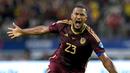 Pemain Venezuela, Jose Rondon melakukan selebrasi setelah mencetak gol penyeimbang 1-1 ke gawang Kanada melalui tendangan jarak jauh pada laga perempat final Copa Ameirca 2024 di  AT&T Stadium, Arlington, Texas, Sabtu (06/07/2024) WIB. (AFP/Juan Mabromata)