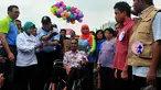 Ahok dan Mensos Khofifah saat acara peringatan Hari Kesetiakawanan Sosial Nasional, Jakarta, Sabtu (13/12/2014). (Liputan6.com/Johan Tallo)