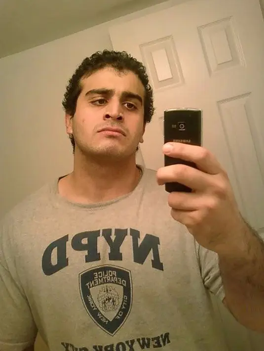 Foto tak bertanggal memperlihatkan wajah Omar Mateen. Seddique, ayah Mateen mengatakan tindakan brutal anaknya itu merupakan dampak dari kemarahannya setelah melihat dua pria gay berciuman di Miami beberapa bulan yang lalu. (HANDOUT/MYSPACE.COM/AFP)