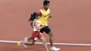 Susan Unggu atlet cabang para atletik nomor lari 400 meter putri klasifikasi T11 pada Asian Para Games 2018, di Stadion Utama Gelora Bung Karno Jakarta, Kamis(11/10/2018).  (Bola.com/Peksi Cahyo)