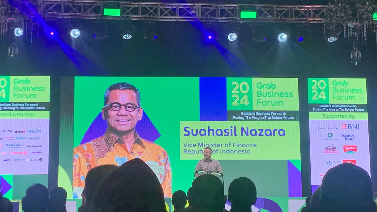 Wakil Menteri Keuangan (Wamenkeu) Suahasil Nazara, dalam Grab Business Forum 2024 di Grand Ballroom Hotel Kempinski, Selasa (14/5/2024). (Tasha/Liputan6.com)