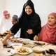 Berbuka Puasa/copyright Freepik.com https://www.freepik.com/free-photo/muslim-woman-sharing-food-ramadan-feast_3214241.htm#fromView=search&page=1&position=9&uuid=091f6bb6-619a-466d-8690-d84b04d873de&query=ramadan+fasting