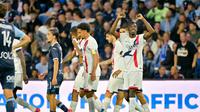 Penyerang Paris Saint-Germain (PSG), Ousmane Dembele, merayakan gol yang dicetaknya ke gawang Le Havre dalam laga pekan perdana Ligue 1 Prancis di Stade Oceane, Havre, Sabtu (17/8/2024). PSG menang 4-1 dalam pertandingan ini. (LOU BENOIST / AFP)