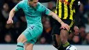 Gelandang Arsenal, Granit Xhaka berebut bola dengan  pemain Watford, Christian Kabasele dalam laga lanjutan Premier League 2018-19 pekan ke-34 di Vicarage Road, Senin (15/4). Arsenal sukses mengalahkan tuan rumah Watford dengan skor tipis 1-0. (Reuters / Matthew Childs)