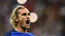Antoine Griezmann saat merayakan gol pada pertandingan kualifikasi Piala Dunia FIFA 2018 antara Prancis vs Belanda di Stade de France di Saint-Denis, Paris, Agustus 2017. (Photo by Christophe Simon / AFP)