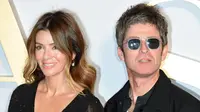 Noel Gallagher dan Sara MacDonald . (Adrian DENNIS / AFP