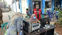 Pelaksanaan vaksinasi COVID-19 di Kelurahan Koang Jaya, Tangerang. (Liputan6.com/Diviya Agatha)