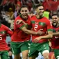 Maroko. Maroko menjadi negara Afrika terbaru alias keempat yang mampu lolos ke perempatfinal di Piala Dunia edisi terbaru pada 2022 di Qatar. Achraf Hakimi dkk bahkan bisa menjadi wakil Afrika pertama yang mampu lolos hingga semifinal bahkan menjadi juara jika mampu memenangi laga perempatfinal melawan Portugal. Pada fase grup, Maroko berhasil memuncaki Grup F di atas Kroasia dan mampu membuat Belgia angkat koper lebih awal. Pada fase knock-out, Spanyol menjadi korban keganasan Maroko di babak 16 besar dengan kemenangan 3-0 (0-0) lewat adu penalti. (AFP/Javier Soriano)