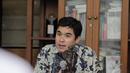 Sekjen Aliansi Jurnalis Independen (AJI), Arfi Bambani, menyampaikan keterangan dalam konferensi pers di Jakarta, Selasa (23/12/2014). (Liputan6.com/Faizal Fanani)