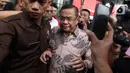 Bupati Pati Sudewa alias Sudewo saat meninggalkan gedung Merah Putih Komisi Pemberantasan Korupsi (KPK), Jakarta, Senin (22/9/2025). (Liputan6.com/Helmi Fithriansyah)