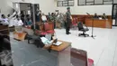 Terdakwa Brigjen Teddy Hernayadi menjalani sidang pembacaan vonis di Pengadilan Militer Jakarta, Rabu (30/11). Majelis hakim menjatuhkan vonis hukuman penjara seumur hidup kepada terdakwa korupsi USD 12 juta Brigjen Teddy. (Liputan6.com/Helmi Afandi)