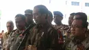 Presiden Joko Widodo (Jokowi) didampingi Kapolri Tito Karnavian dan Mensesneg Pratikno memberikan keterangan pers usai arahan kepada jajaran Polri terkait pengamanan negara di Auditorium PTIK, Jakarta, Selasa (8/11). (Liputan6.com/Faizal Fanani)