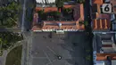 Foto udara suasana pedestrian di kawasan Kota Tua, Jakarta, Kamis (1/9/2022). Jalur pedestrian yang menghubungkan Stasiun Jakarta Kota dengan Kawasan Wisata Kota Tua itu selesai direvitalisasi dan sudah bisa digunakan pejalan kaki. (Liputan6.com/Herman Zakharia)