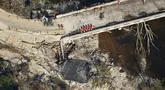 Foto udara menunjukkan kerusakan akibat banjir bandang di sepanjang Sungai Guadalupe, Ingram, Texas, Kamis, 10 Juli 2025. (AP Photo/Gerald Herbert)