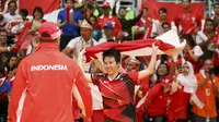 Pasangan ganda campuran Indonesia, Tontowi Ahmad/Liliyana Natsir, merayakan kemenangan atas ganda campuran Malaysia, Chan Peng Soon/Goh Liu Ying, di final cabang bulutangkis Olimpiade Rio de Janeiro 2016 (Reuters).