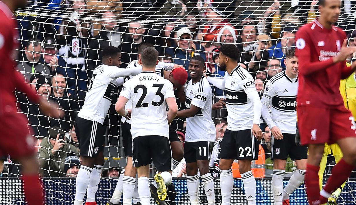 Selebrasi gol Fulham dari Ryan Babel pada laga lanjutan Premier League yang berlangsung di Stadion Craven Cottage, London, Minggu (17/3). Liverpool menang 2-1 atas Fulham. (AFP/Glyn Kirk)