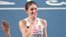 Ekspresi Pia Skrzyszowska dari Polandia saat memenangkan semi final perlombaan lari gawang 60m putri dalam Kejuaraan Atletik Indoor Eropa 2021 di Torun. (Foto: AFP/Sergei Gapon)