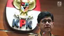 Wakil Ketua KPK, Laode Muhammad Syarif dalam konferensi pers di Jakarta, Sabtu (7/10). KPK melakukan OTT terhadap Ketua Pengadilan Tinggi Manado SDW dan Anggota DPR Komisi XI dari Fraksi Golkar AAM serta tiga orang lainnya. (Liputan6.com/Helmi Afandi)