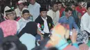 Menpora Imam Nahrawi (tengah) bersama para atlet pelatnas Asian Games 2018 saat buka puasa bersama di Jakarta, Senin (28/5). Acara tersebut dihadiri atlet pelatnas Asian Games 2018 dan para mantan atlet peraih medali. (Liputan6.com/Helmi Fithriansyah)