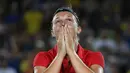 Atlet tenis Belgia, Kirsten Flipkens merayakan keberhasilannya mengalahkan atlet tenis AS, Venus Williams pada cabang tunggal putri di Olimpiade Rio 2016, 9 Agustus 2016. (AFP PHOTO/ Luis Acosta)