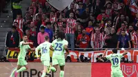 Selebrasi pemain Barcelona saat mengalahkan Atletico Madrid di leg kedua semifinal Copa del Rey (AFP)